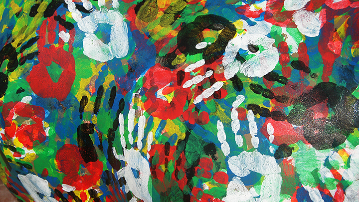 Multicolored overlapping handprints